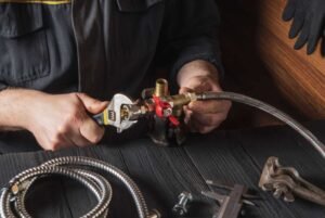 repairman fixing gasline