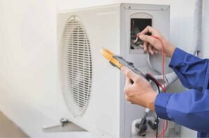 man doing ac maintenance
